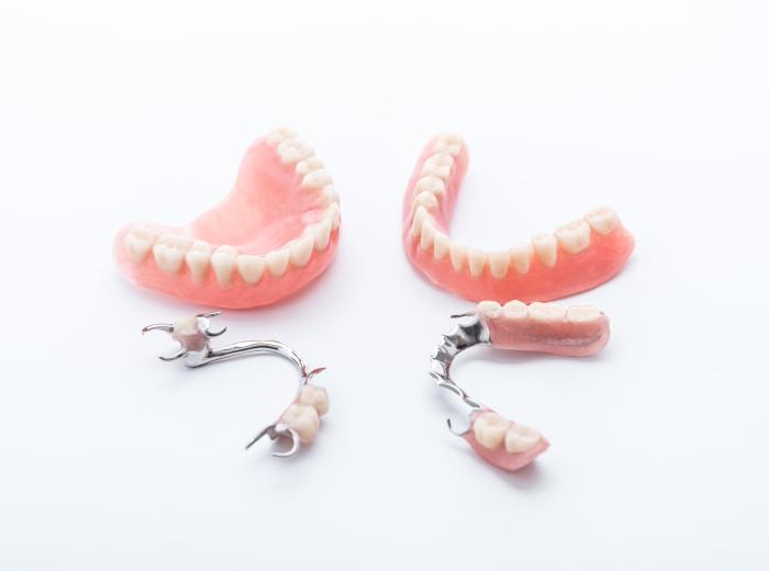 Dentures, partial dentures, and dental bridges: What’s the difference?