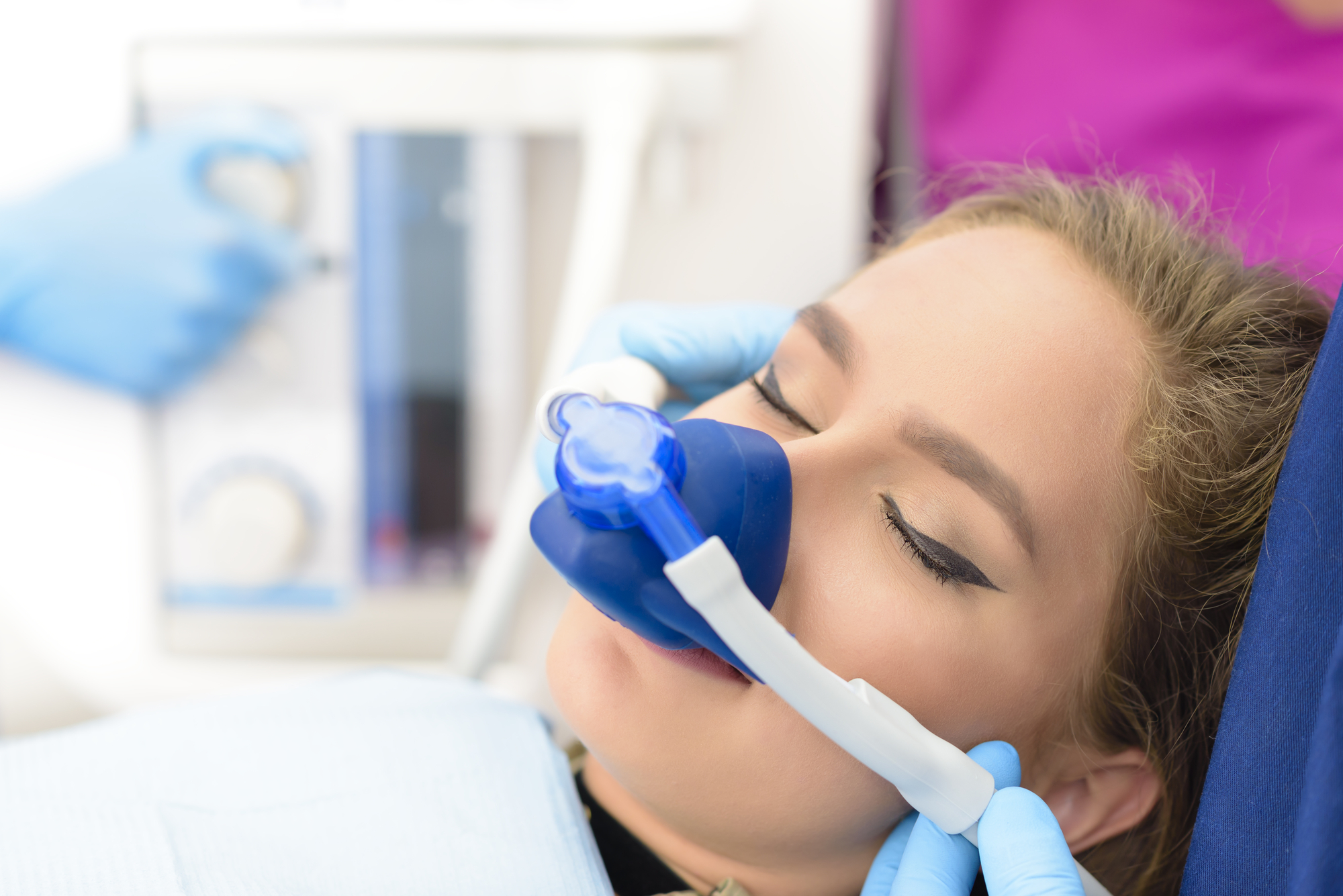woman undergoing sedation dentistry